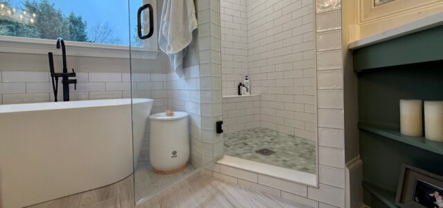 Master bathroom remodel with tile shower enclosure and tile floor.
