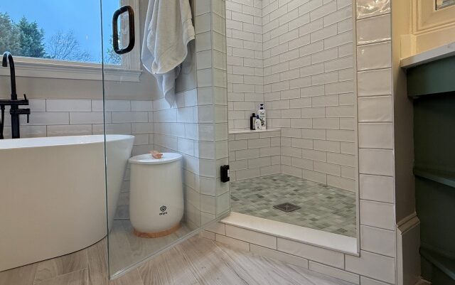 Master bathroom remodel with tile shower enclosure and tile floor.