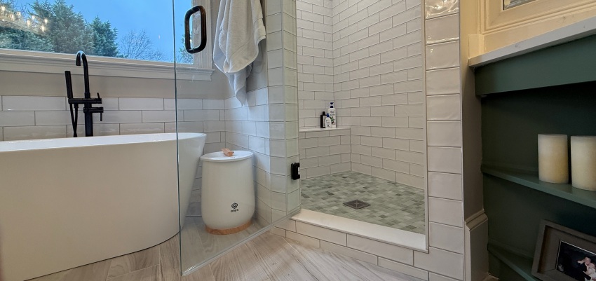 Master bathroom remodel with tile shower enclosure and tile floor.